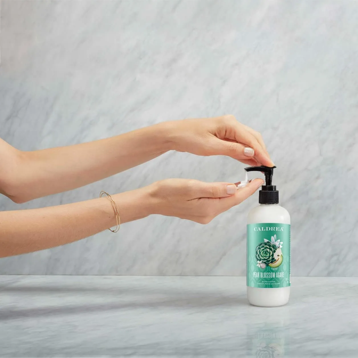 Caldrea Hand Lotion, For Dry Hands, Made with Shea Butter, Aloe Vera, and Glycerin and Other Thoughtfully Chosen Ingredients, Pear Blossom Agave Scent, 10.8 oz (Packaging May Vary)